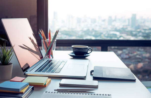 A picture of a table with a laptop.